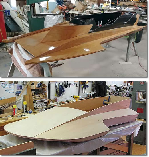 Two hydroplane speedboat hulls being built in a shop